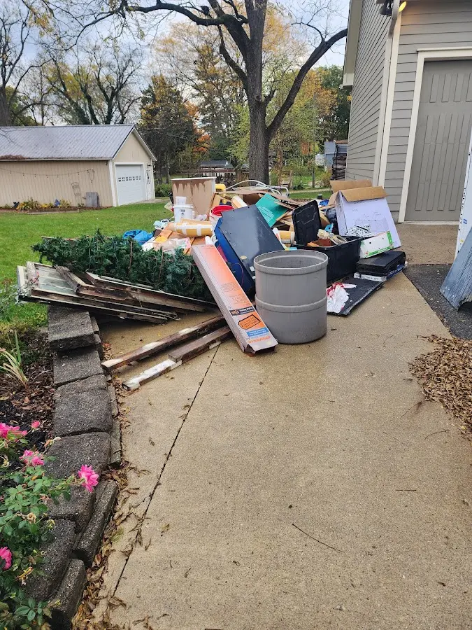Dumpster being loaded with debris for 3 Yard Dumpster Rental in South Heidelberg